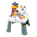 Smoby Didaktický stolek s vkládacími kostkami Activity Table Little Smoby s aktivitami na vývoj jemné motoriky od 12 měsíců