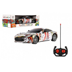 Auto závodní RC graffiti plast 23cm 27MHz na dálk. ovl. na baterie se světlem v krab. 29x9x13cm Auto závodní RC graffiti plast 23cm 27MHz na dálk. ovl. na baterie se světlem v krab. 29x9x13cm