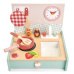  Tender Leaf Toys Dřevěná kuchyňka v šuplíku Kitchenette  s hodinami pánvičkou a potravinami